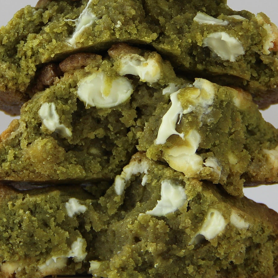 Inside a broken-open Matcha & White Chocolate cookie